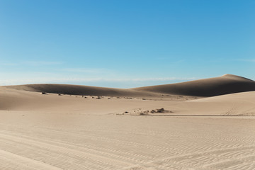 Fototapeta na wymiar White sand dunes at Mui Ne village Vietnam