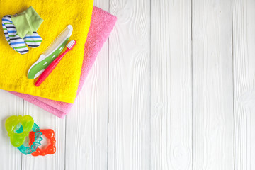 baby accessories for bath on wooden background