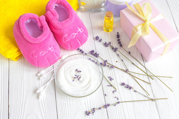 baby organic cream with lavender on shelf in bathroom