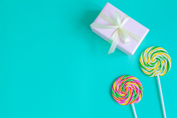 birth of child - lollipop on blue background