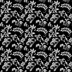 Seamless pattern with white flowers on a black background