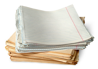 Stack of old yellowed sheets of school notebooks