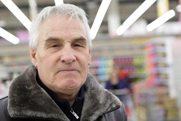 Senior man in market