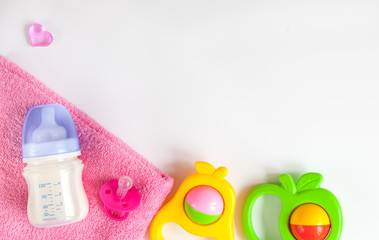 baby bottle with milk on white background top view