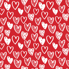 Valentine's day seamless pattern with cute doodle hearts. White ink on red isolated background. Vector ornamental design for textile and wrapping paper.