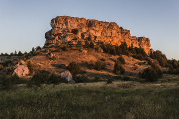 Naklejka premium Crag at sunset. Calatañazor, Soria, pain, Europe.