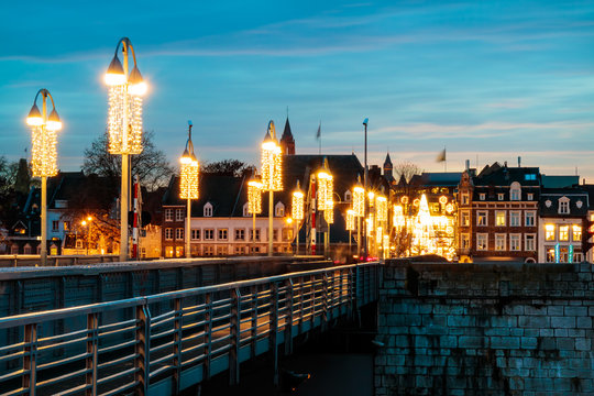 View at the Dutch Sint Servaas bridge with christmas lights in Maastricht