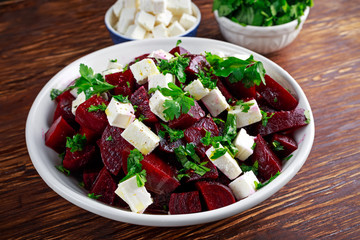 Healthy beetroot, feta cheese salad with parsley
