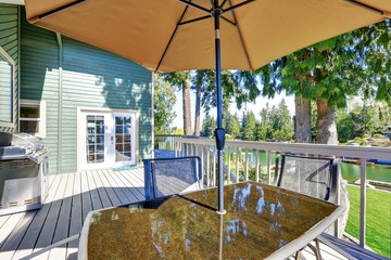 Interior of wraparound deck with amazing view of Lake Tapps.