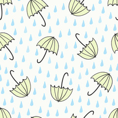 Seamless pattern with hand drawn umbrellas and rain drops in blue and yellow on cream background.