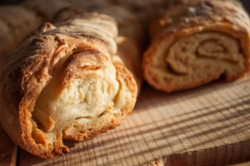 Homemade french baguette on a wooden surface