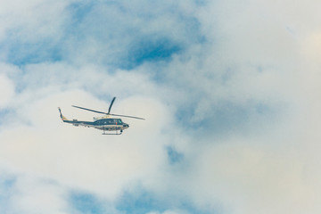 Fototapeta na wymiar helicopter in sky