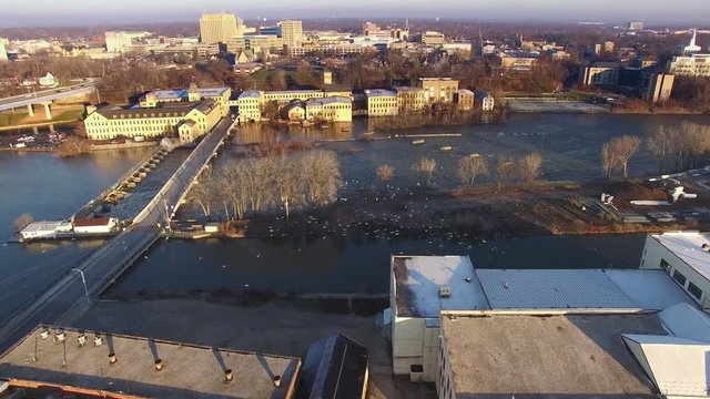 Flock of Seagulls Flies over Scenic Dam, River, Waterfront. Appleton Wisconsin, Fox River.