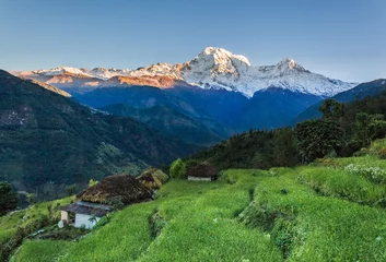 Fototapete Nepal Mountain village in the morning seen during trip around Annapurna mountain
