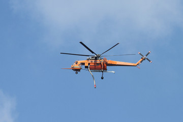 Fototapeta na wymiar Orange Fire Helicopter
