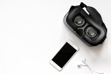 virtual reality glasses with smartphone on white background