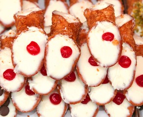 Sicilian pastries called CANNOLI with pastry cream for sale in p
