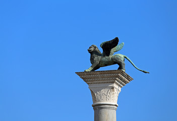 statue of the winged lion symbol of the City of Venice in Italy