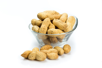 A pile of peanuts on a white background