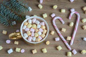 Hot cocoa with marshmallows and Christmas decorations