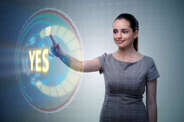 Businesswoman pressing virtual button YES