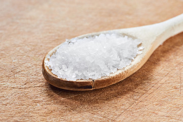 Sea salt in a wooden spoon