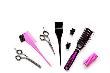 Tools for hair styling on white background top view