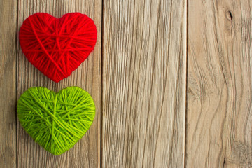 Green and Red heart shape symbol made from wool. Love, Valentine