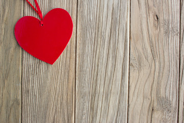 Red heart shape symbol on wooden boards. Love, Valentine's Day,
