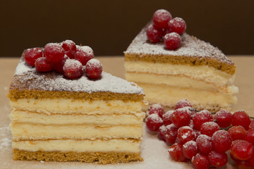 Pieces puff cheesecake decorated with icing sugar