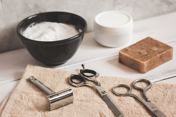 Mens hairdressing wooden desktop with tools for shaving