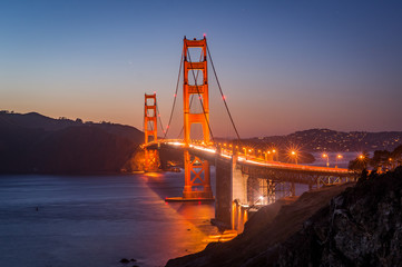 Sunset over Golden Gate Bridge in San Francisco, California, USA
