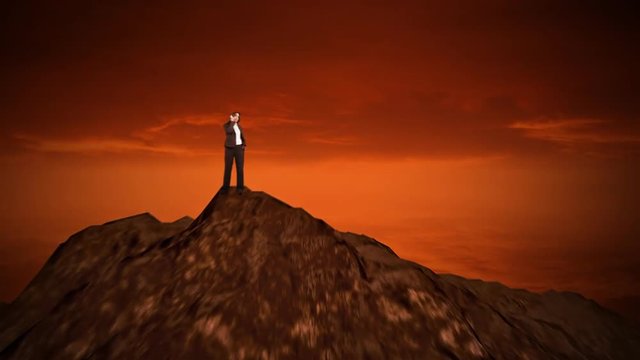 Business woman talking on the phone on the top of the hill.