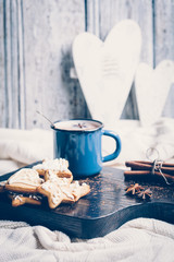 Christmas composition with gingerbread and cup of cocoa