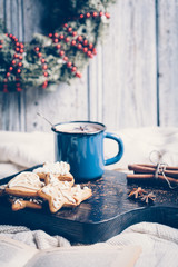 Christmas composition with gingerbread and cup of cocoa