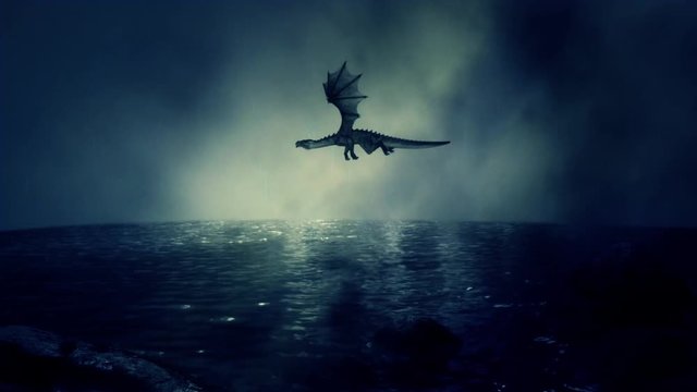 Dragon Flying Above Lake with Water Reflection