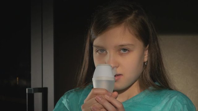 nebulizer, cute girl using inhaler