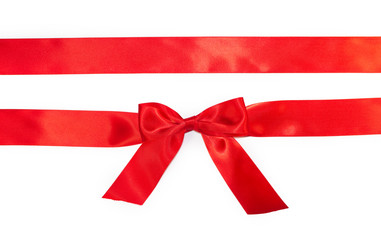 Red horizontal gift ribbons and luxurious bow