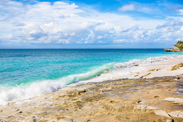 Tropical beach, rocks and ocean