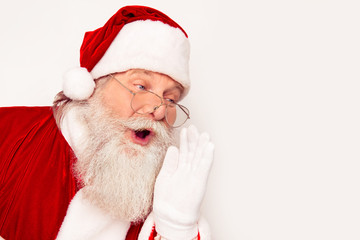 Excited Santa Claus  with open mouth saying Ho-ho-ho