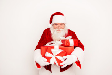 Santa Claus presenting gifts  isolated on white background