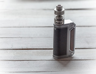 Modern electronic mod vaping device. New vaporizer e-cig gadget dna. 