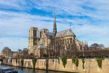 Fototapeta na wymiar Seine river and Cathedral Notre Dame de Paris in december , Paris, France