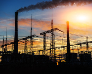 power plant at sunset