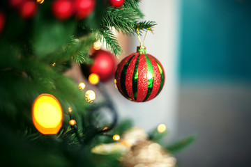 bright ball on the Christmas tree. The concept of Christmas 