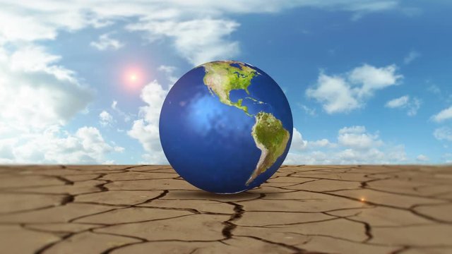Orbiting Earth Globe On Cracked Desert