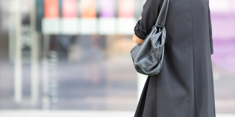 Elegant lady shopping outdoor in the street