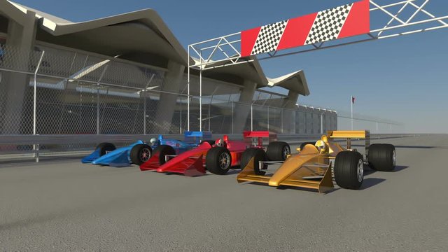 Formula one racing carts getting ready to start