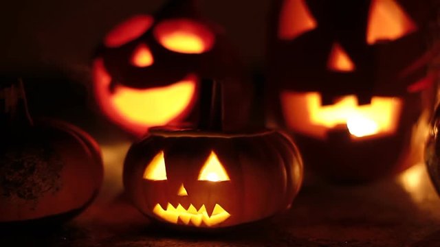 slider dolly shot of spooky halloween pumpkins