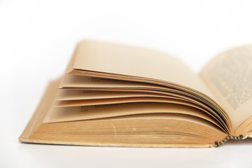 open old book closeup on white background